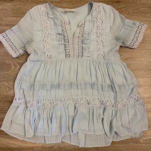 Women’s small light blue blouse